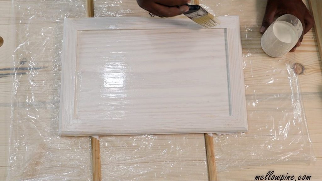 applying primer on the tray