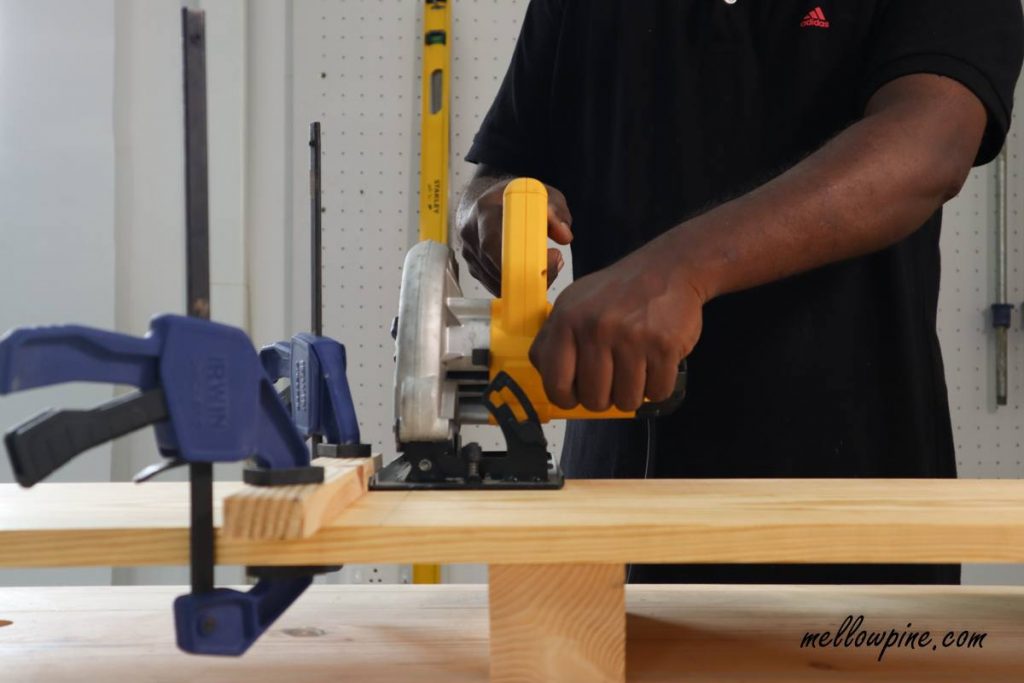 cutting the board using circular saw