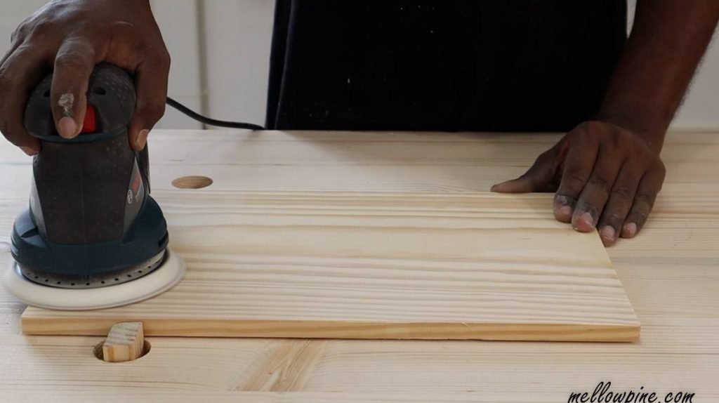 sanding the board