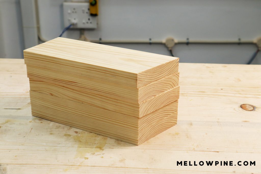 Wood pieces stacked after planing