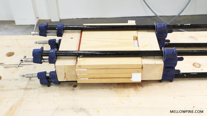 Clamping the shelf pieces together.