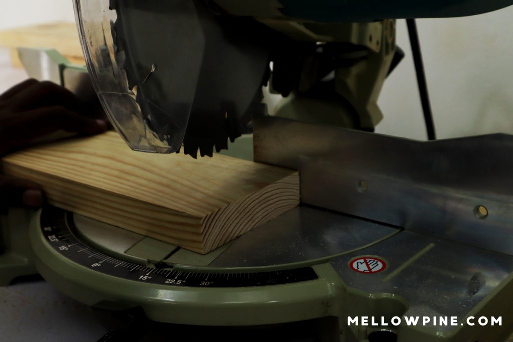 Mitering the top edge of each piece at a 15 degree angle