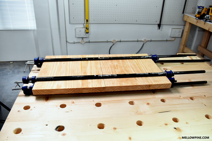 Clamping the boards for the leg pieces together after gluing