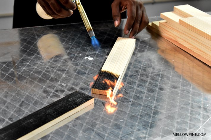 burning pine wood piece