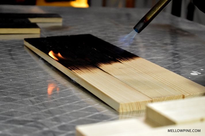 burning pine wood piece