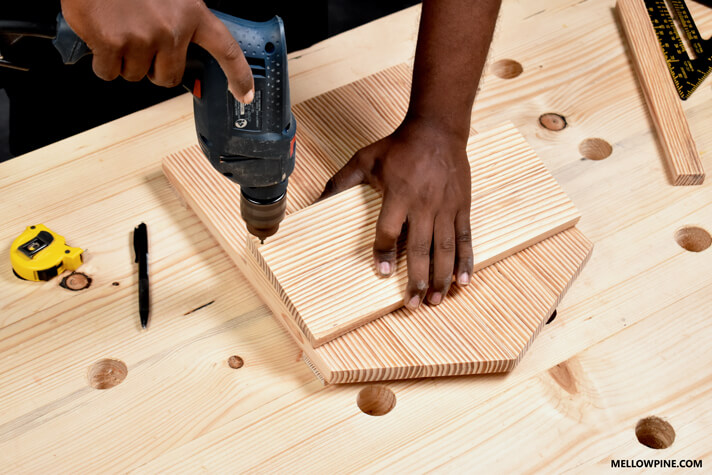 Fixing the face pieces of the letter rack using screw