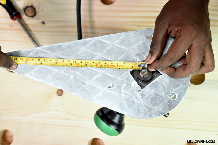 We made this jig using scrap aluminium for the router to cut in a circle