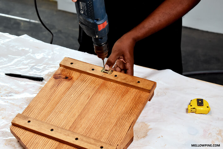 Fixing the bracket for hooking the key holder on the wall