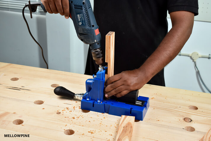 Drilling pocket holes in the cross piece