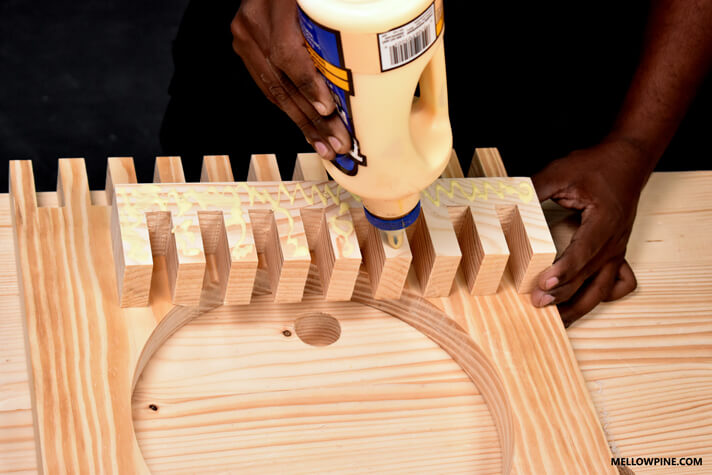 Applying glue on the support piece before fixing it to the leg piece