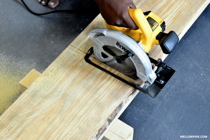Cutting the boards for the leg pieces of the bench