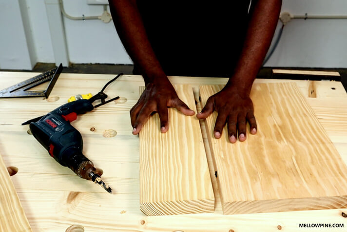 Marking the dowel hole location on the second piece using the drill center