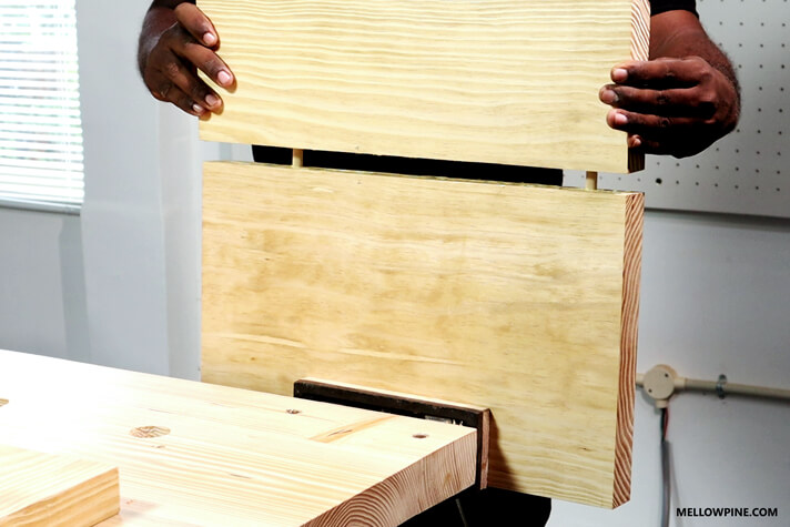 Putting the two board pieces for the leg piece together