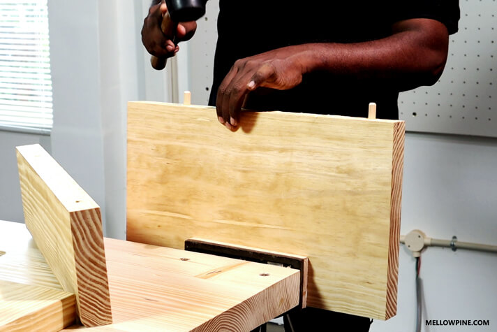 Inserting the dowel pins in the board piece