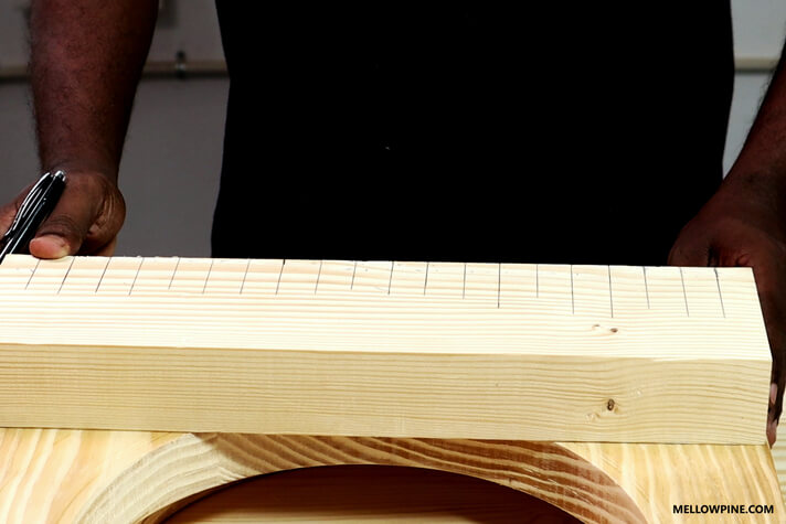Support piece with slot locations marked for box joint