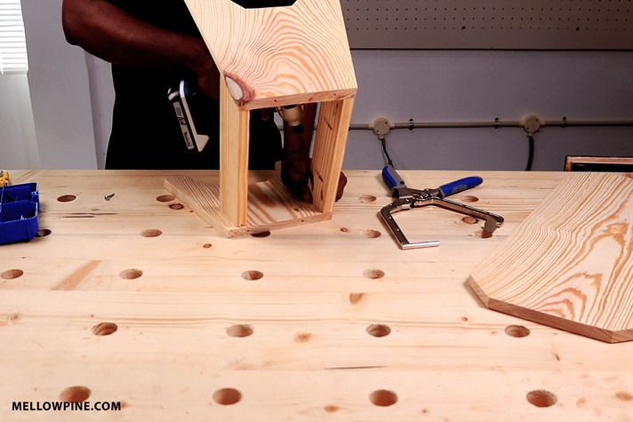 Joining the bracing piece to the leg using pockethole screw
