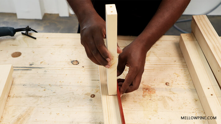 Marking the dowel location using the drill center and the stop block
