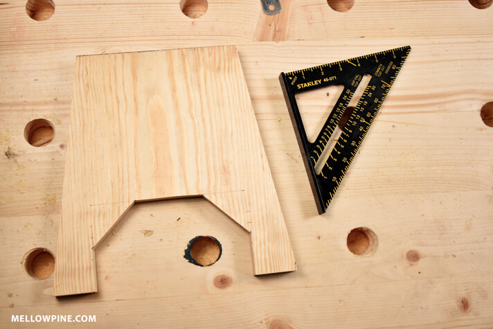 The leg piece after cutting the triangle and the center slot