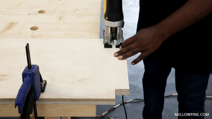 Cutting the slots for the legs in the shelf plywood