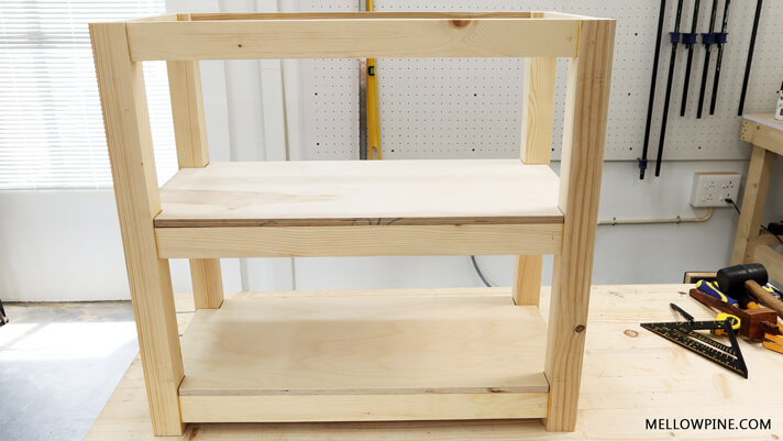 Frame with shelves fixed