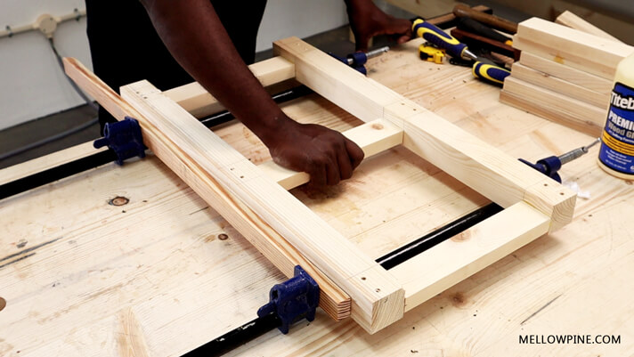 Clamping one side of the frame