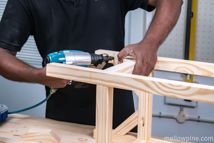 Nailing the inclined bracing pieces to the frame