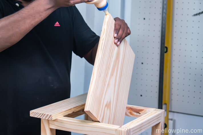 Applying wood glue on the larger top piece