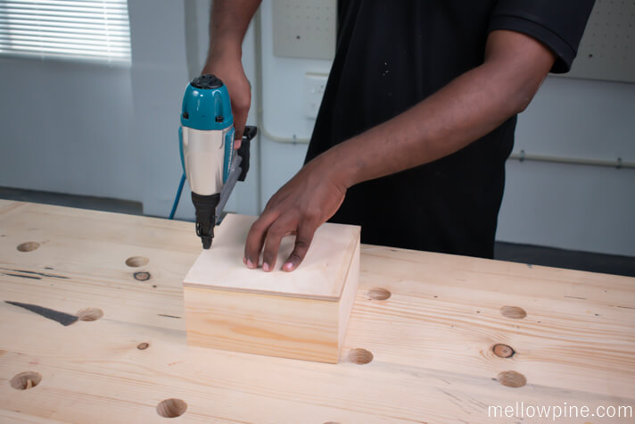 Fixing the plywood to seal the back side of the box
