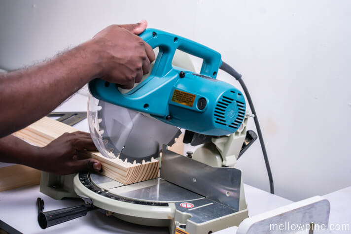 Cutting the pieces for the desk on the miter saw
