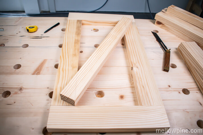 Marking the portion to be cut on the X brace piece