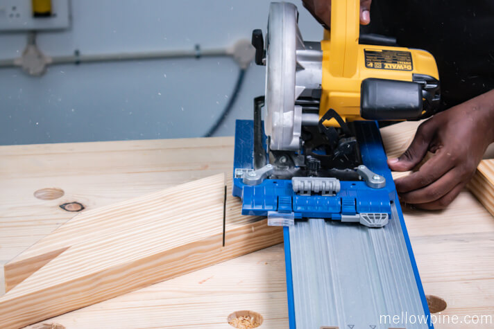 Making cuts in the X brace before chiseling using circular saw