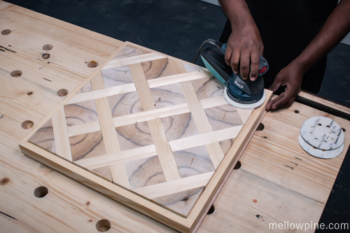 Sanding the pieces after assembling to remove minor bumps
