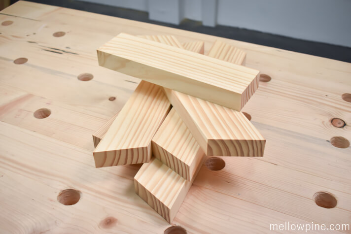 Four pieces for the X brace and two pieces for the base
