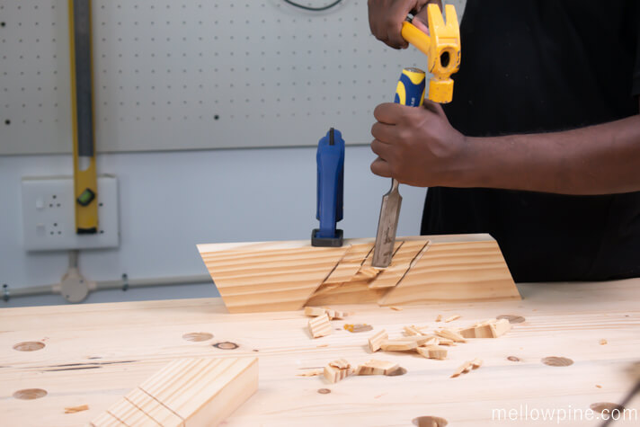 Chiseling the wood for half lap slots