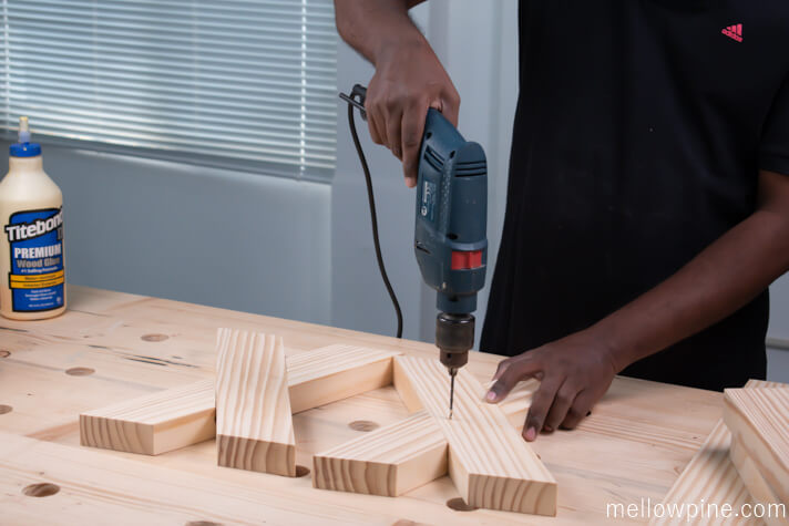 Drilling pilot hole for joining the X brace pieces