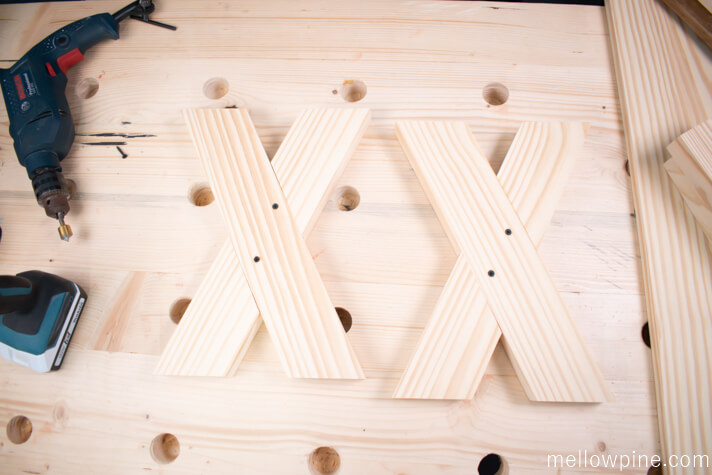 X brace pieces joined together
