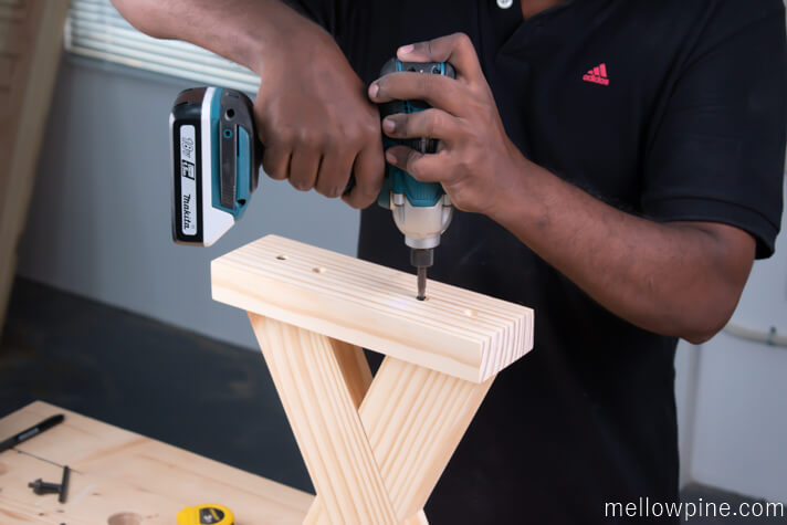 Screwing the Base Piece to the X brace