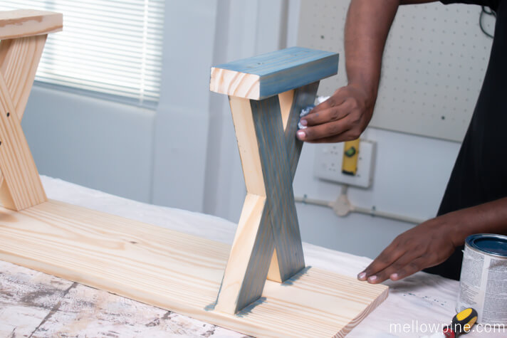 Applying stain to the X Bench