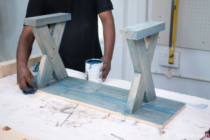 Applying stain to the X Bench