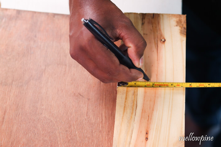 Marking the mid point using tape and pen
