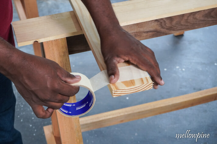 fixing masking tape on the line of cut