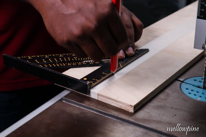 marking the cut line on the plywood