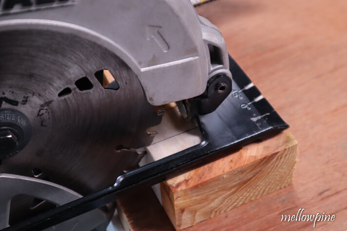 aligning the blade of the circular saw with the cut line