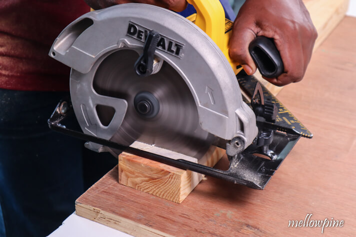 cutting the wood with circular saw