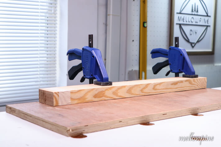 Clamping the wood before cutting with hand saw