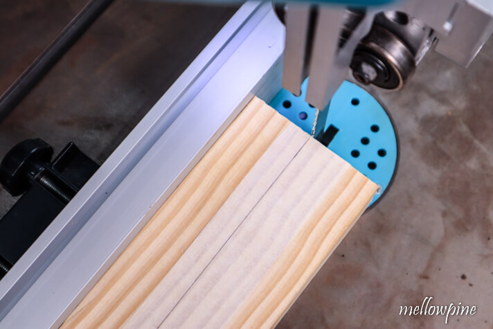 making fine adjustments in the fence to align the blade correctly