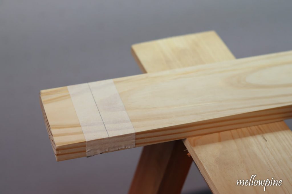 Mark cut line over the masking tape