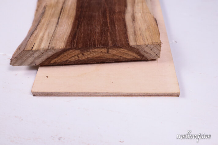 board placed on the plywood with overhang