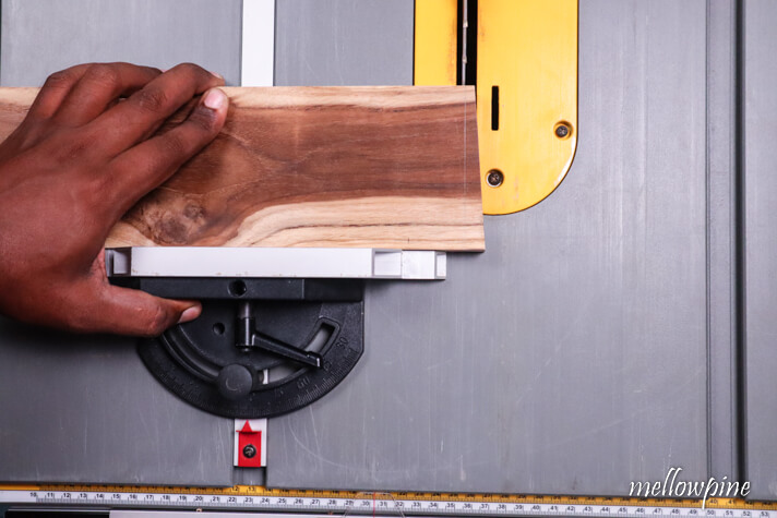 aligning the blade with the line of cut for crosscut