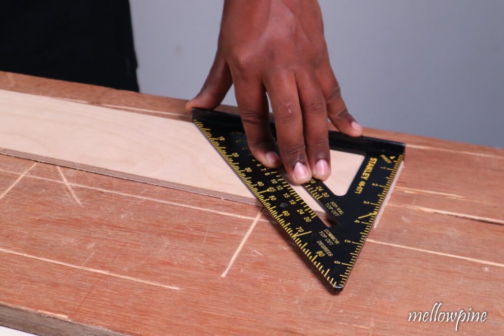Try square on plywood's corner